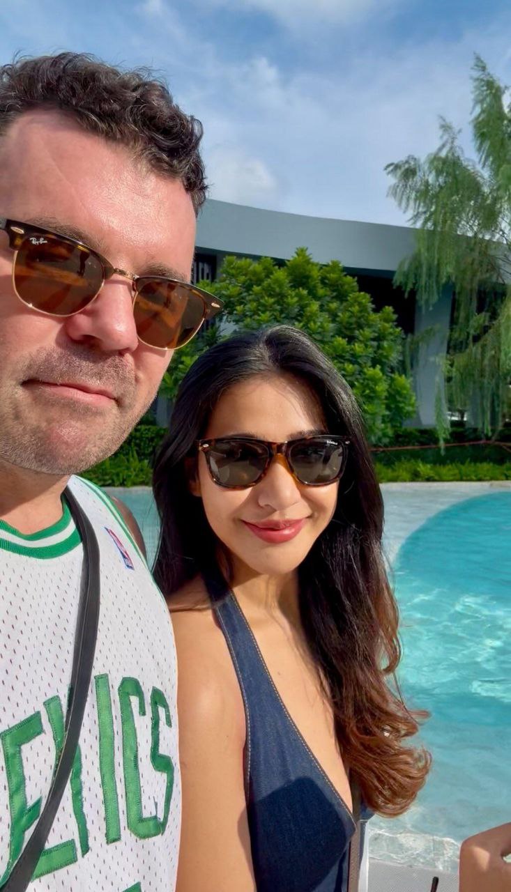 Dr. Bart Scanlon poolside with Wife