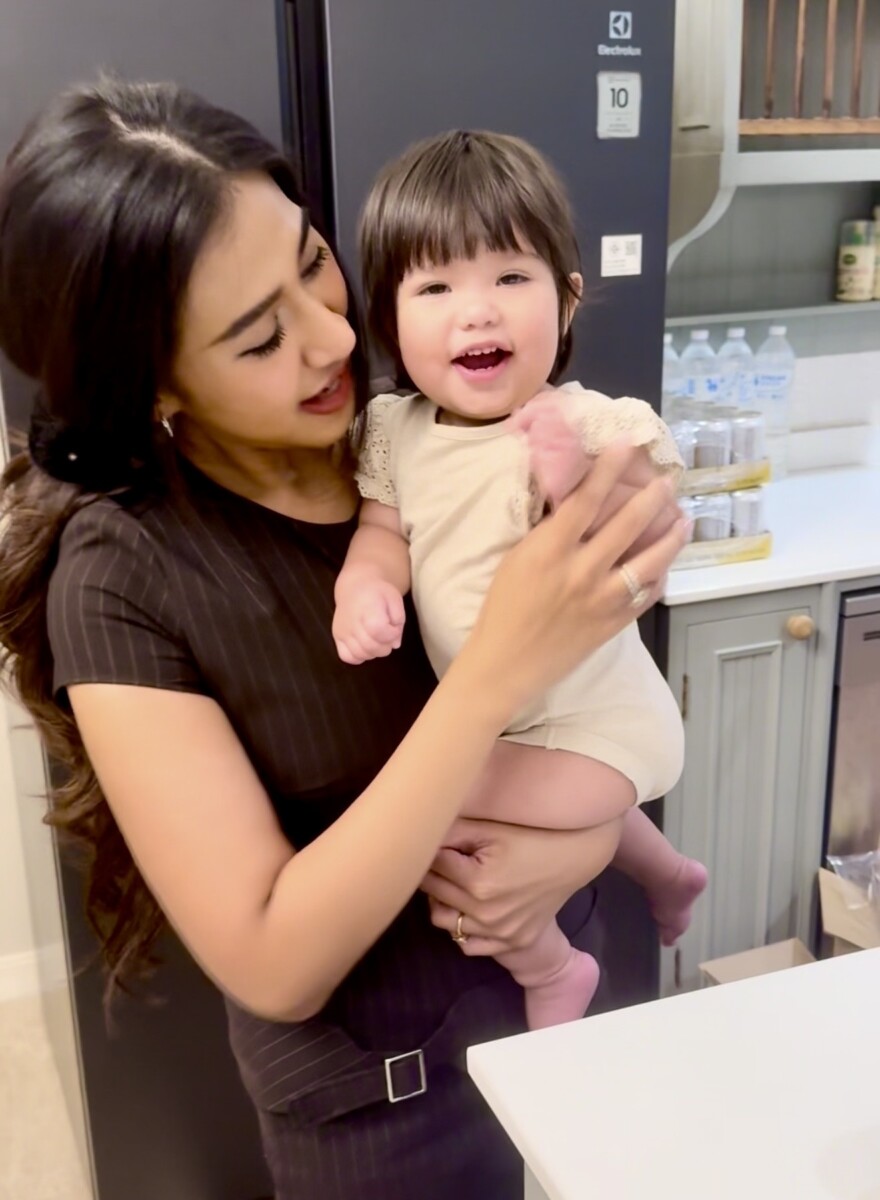 Mother Airada holding daughter