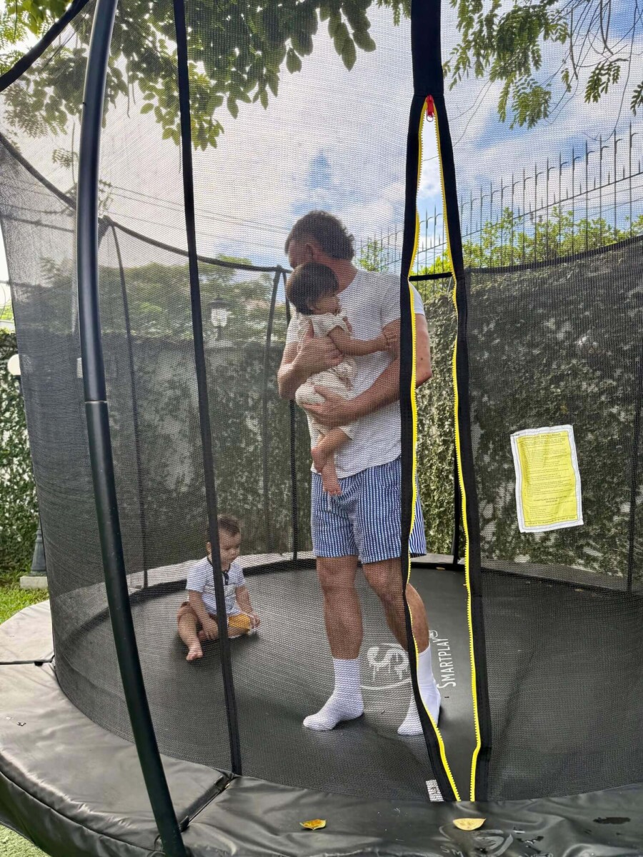 Bart on trampoline with twins
